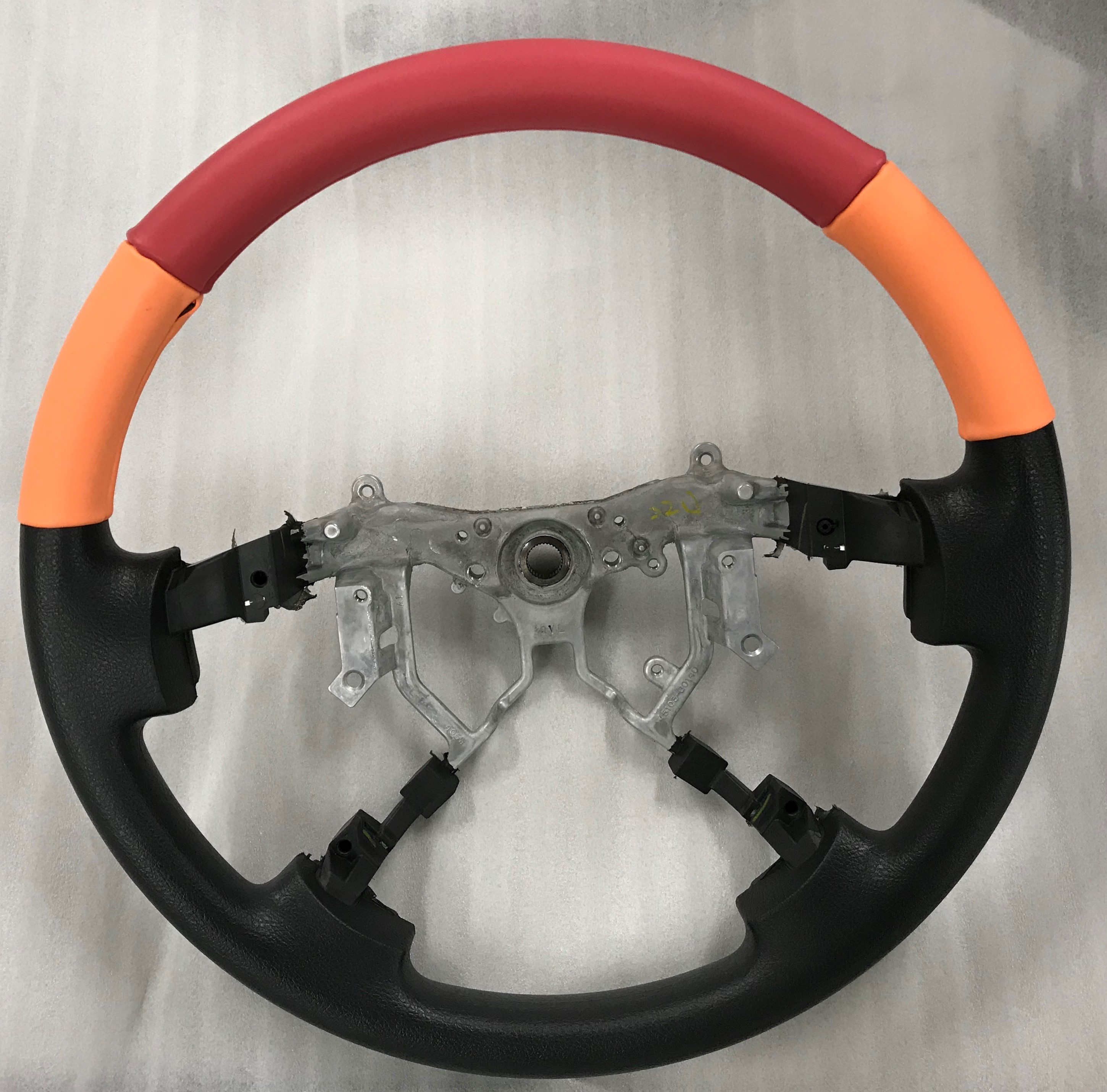 Prototype of a colored fluoroelastomer steering wheel cover